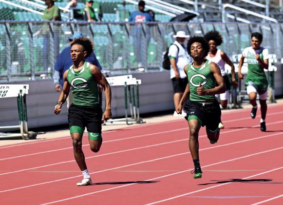 Daylon Gibbs and Kaimarye Lopez race for the finish in the 400M prelims.